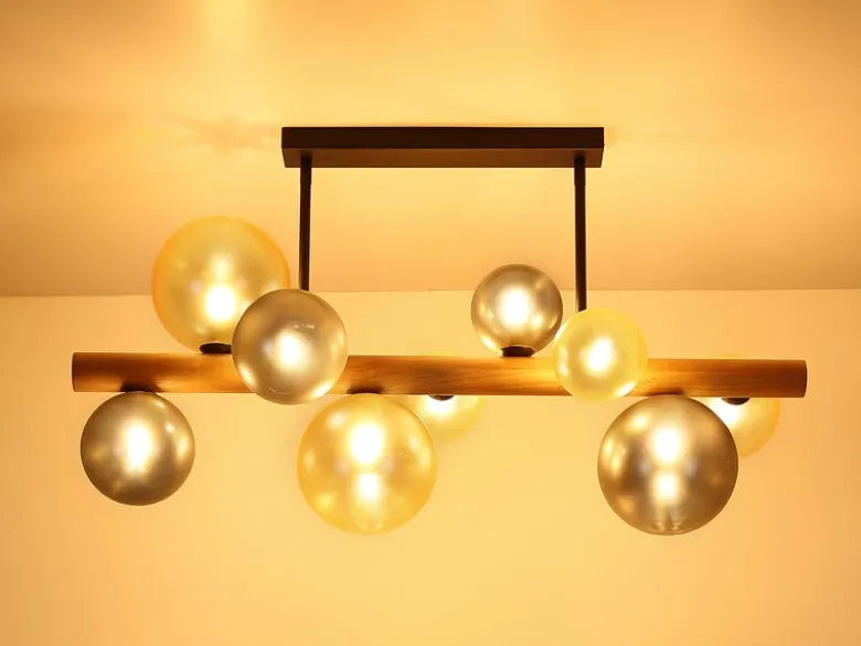 Deckenleuchte RIHA aus Holz 9-flammig Glaskugeln Rauchglas & Bernstein, B: 78cm