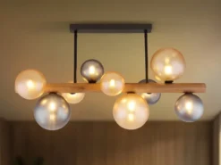 Deckenleuchte RIHA aus Holz 9-flammig Glaskugeln Rauchglas & Bernstein, B: 78cm