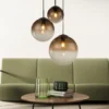 LED Pendelleuchte 3-flammig mit Glaskugeln aus Amberglas, Ø 51cm