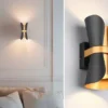 LED Wandlampe Schwarz Gold mit Updown Lichtaustritt, Höhe 21cm