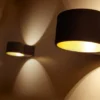 LED Wandleuchte LACAPO Schwarz Gold mit Up and Down Licht, Ø 10,5cm