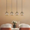 Pendelleuchte LOIS 4-flammig Metall Schwarz Gold mit Glaskristallen, Breite 73cm